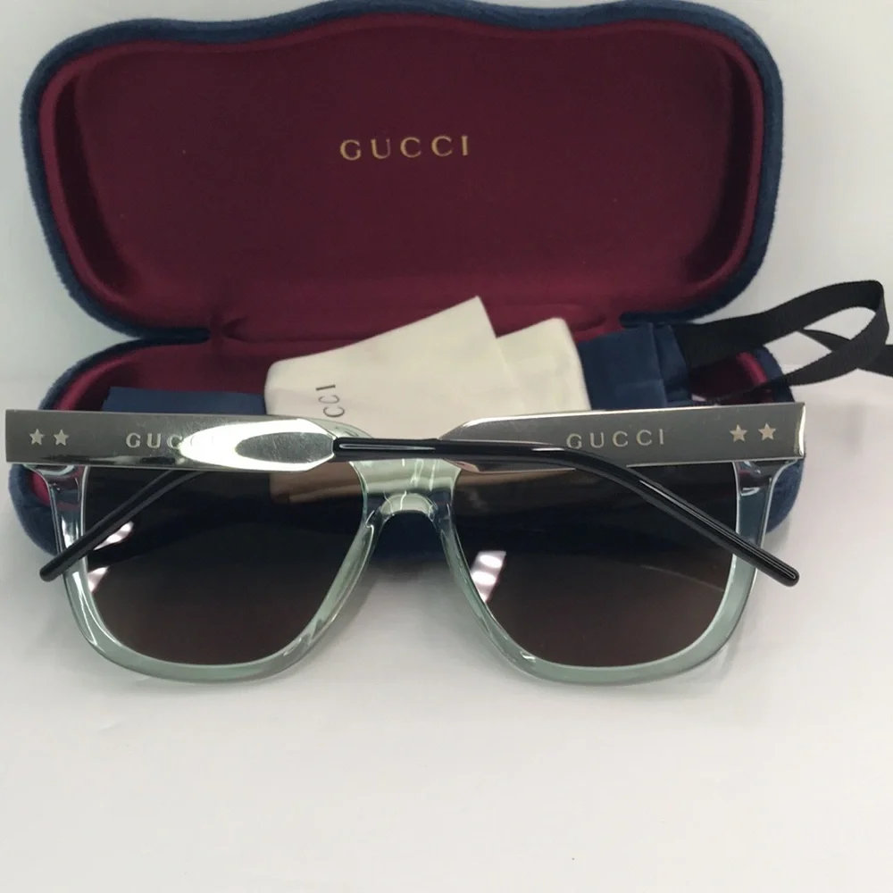 Gucci GG0976S 002 in injected material , in green rectangular/square Sunglasses